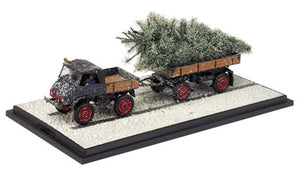 Schuco Edition 1:43 Unimog 401 pulling trailer with tree